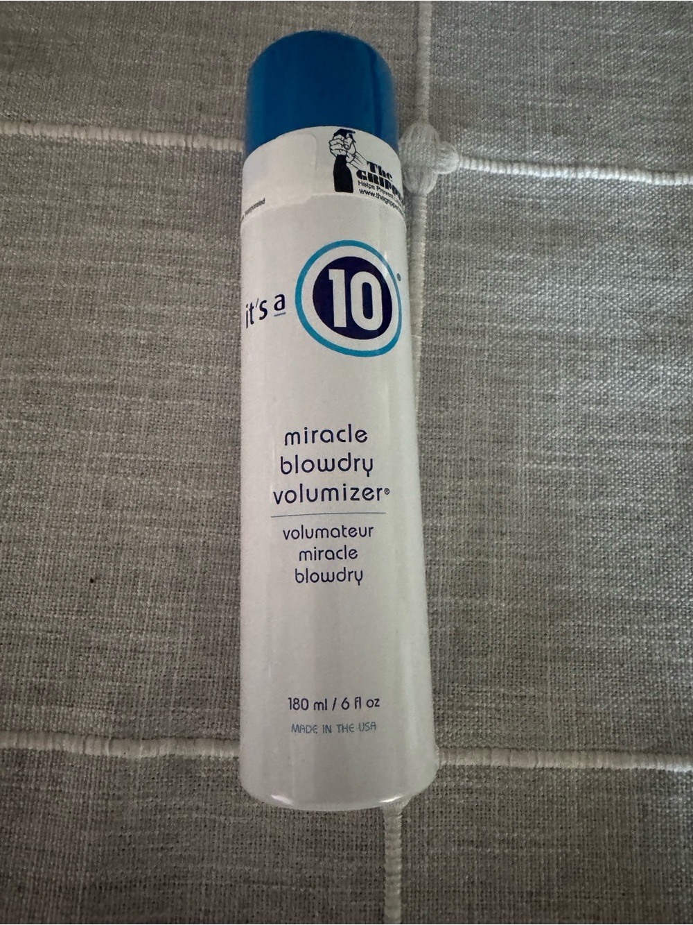 it's a 10 Miracle Blowdry Volumizer Spray - White & Blue